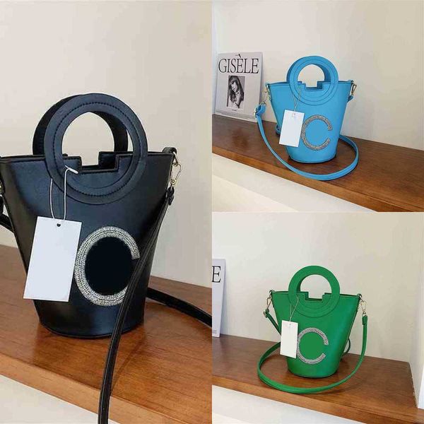

women bucket candy color portable single shoulder bag texture bucket inlaid diamond messenger armpit with baseball hat 220611