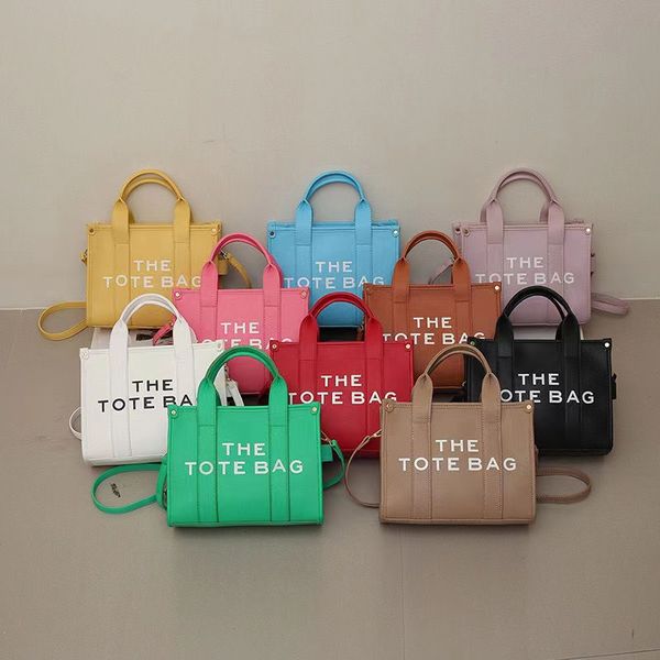 

2023 new fashion designer versatile bag american women diagonal straddle tote bag one shoulder handheld