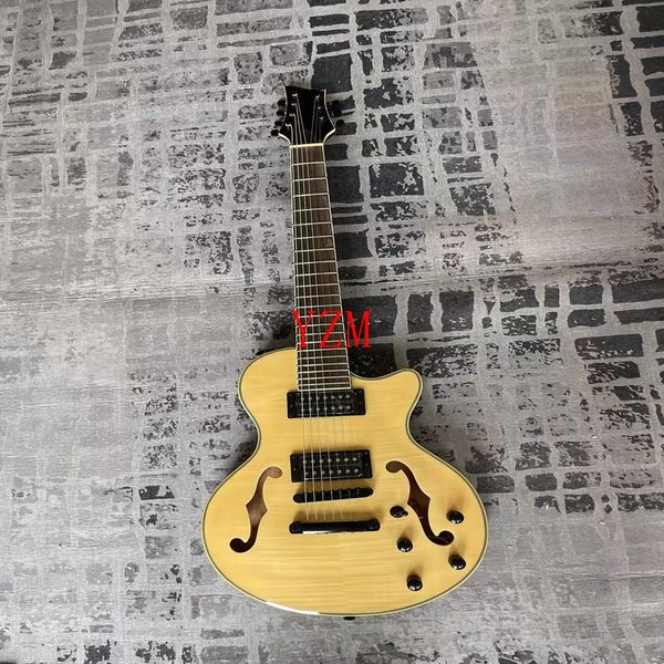 

f-hole rosewood fingerboard six-string electric guitar