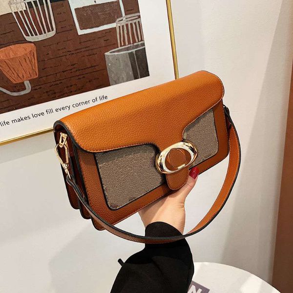

designer fashion classic jacquard fabric stylepolished pebble grain leather tabby 26 shoulder bag gold-tone logo lettering armpit bags