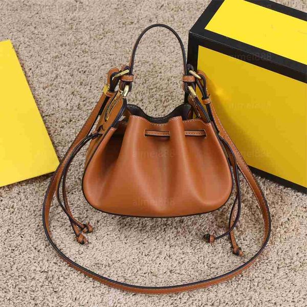 

fendace mini handbag messenger bag with drawstring closure with interior compartment and gold metal handle or removable shoulder strap rg07