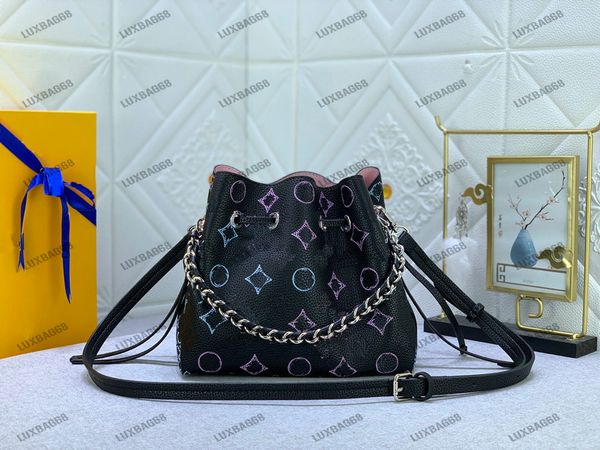 

flight mode bella drawstring bucket bag m21096 mahina calf leather chain crossbody perforated monograms pattern handbag with round coin purs