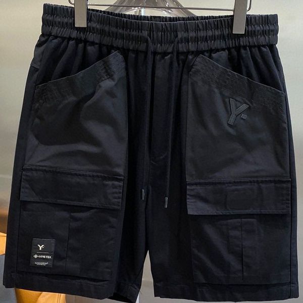 

mens and women summer fashion athleisure cargo shorts letter pocket beach shorts, White;black