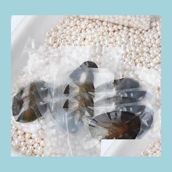 

pearl wholesale oysters with dyed natural pearls inside open at home in vacuum packaging drop delivery jewelry dhasg, White