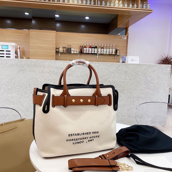 

canvas handbag tote bag large capacity pocket cowhide leather removable strap bottom nail gold hardware fashion letters classic shoulder bag