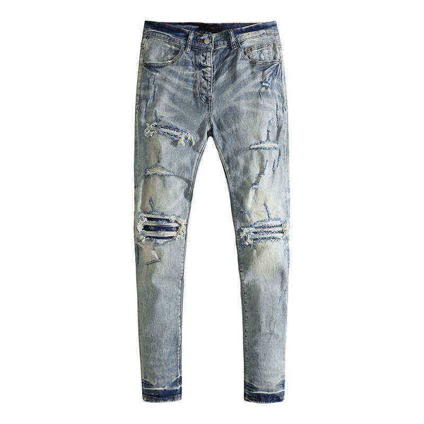 

men's jeans light blue hole worn cashew elastic slim fit men