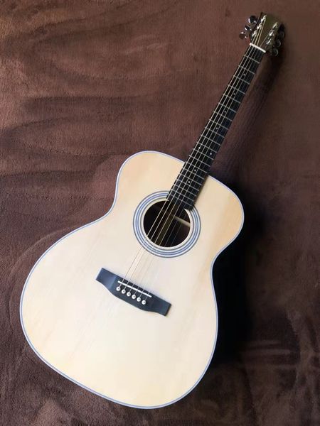 

the 40 "om series is ed with an all-solid acoustic acoustic guitar