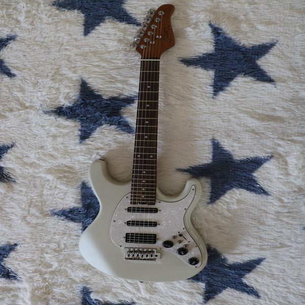 

white high-quality pickup six-string electric guitar