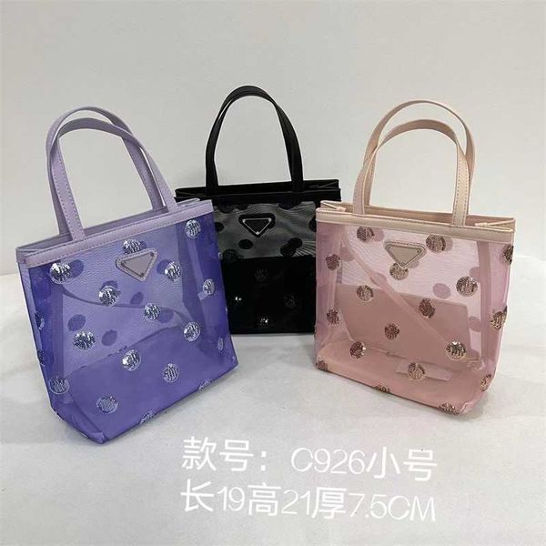 

fashion brand handbag the new p family mesh wave lighting film is decorated with tot bag triangle badge hand-held armpit lower mother and wo
