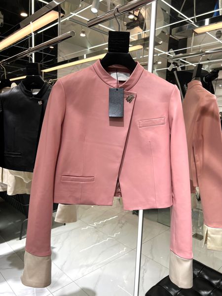 

the latest women's leather jacket is made of high-quality sheepskin. the stand collar design of the patchwork cuffs is very beautiful, Black