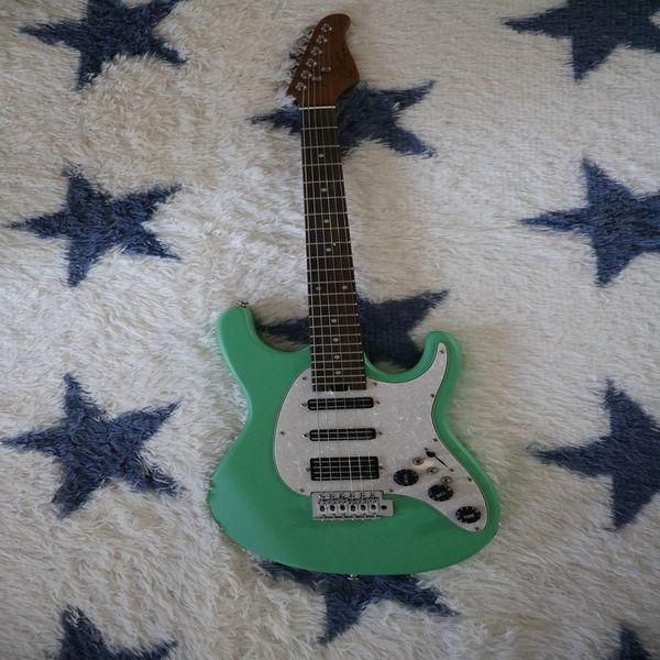 

green matte body silver knob high-end pickup six-string electric guitar