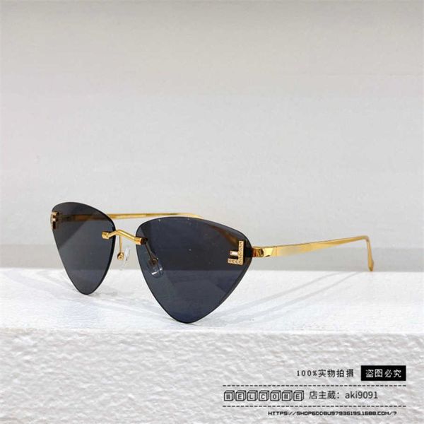 

new luxury designer 2023 new f-home net red same cat eye metal sunglasses fe40047 personality rimless sunglasses, White;black