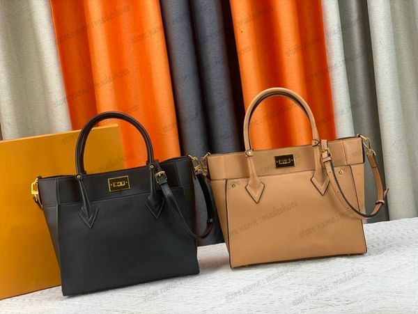 

2023 designer luxuries women shoulder bag by on my sides handbag with stitching of cow leather and monograms perforated cow leather handle s