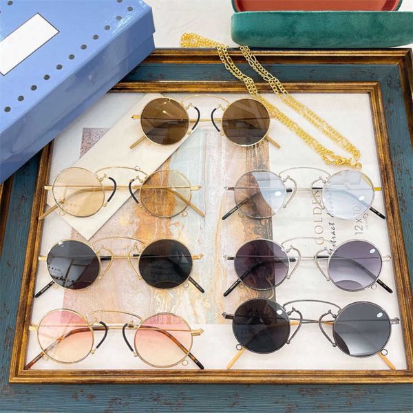 

2023 new luxury designer year new g family oval chain ins ni ni's same personalized sunglasses gg0991s, White;black
