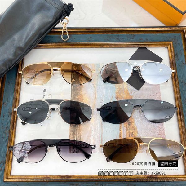 

2023 new luxury designer 23f's new oval sunglasses wind ins net red same metal sunglasses fe40072u, White;black