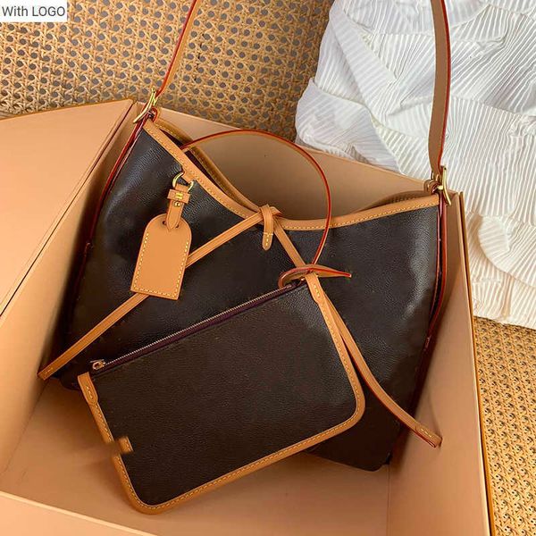 

2023 new 9a bag bag10a designer bag 29cm canvas and leather trim ample configuration features a neat inner canvas zipper holding bag secured, Black