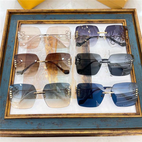 

2023 new luxury designer years old luo yijia's new fashion rimless box star same sunglasses lw40050u, White;black