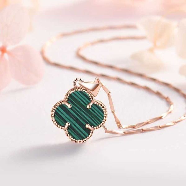 

lucky four-leaf clover sterling silver s999 rose gold necklace designed by female small people colorless peacock green valentine's day