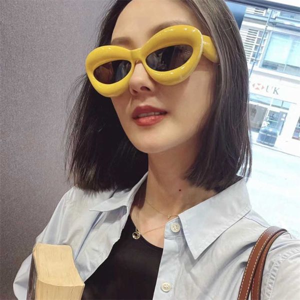 

2023 new luxury designer luoyijia cat's eye sunglasses for women ins the same type of personalized pout lips sunglasses lw40097i, White;black