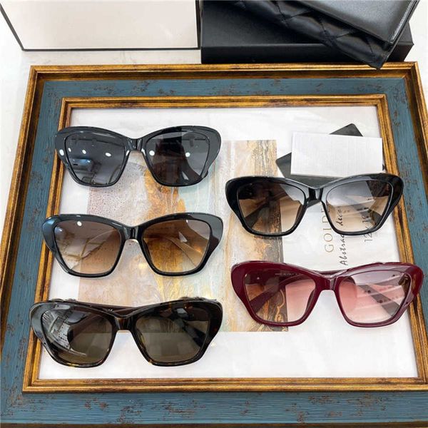 

2023 luxury designer new small fragrant cat eyelids with diamond on the legs the same type of sunglasses 5457qb, White;black