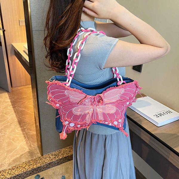 

barbiecoress 2023 early autumn new underarm bag with bow knot, foreign style handheld bag, female minority ins denim tassel shoulder bag 230