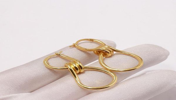 

fahion stainless steel18k gold stud earrings rose goldfashionable simple spiral knotted personality exquisit stud earrings for wom8889266, Golden;silver