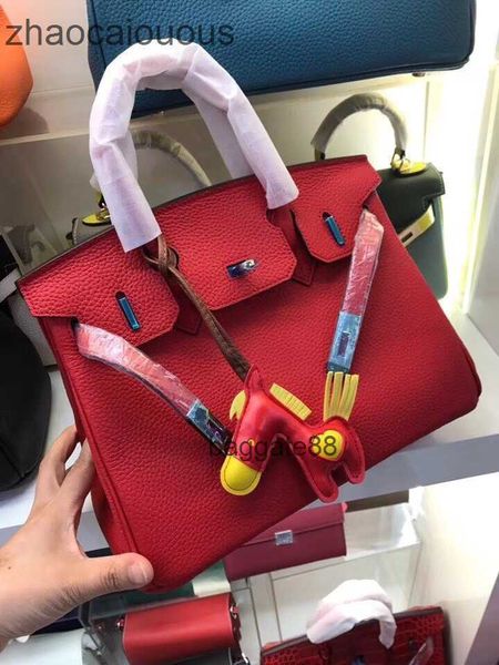 

designer bag cowhide 2023 litchi designer bags hands women's trend single shoulder span hand birkins classic ladies luxurys handbags a8