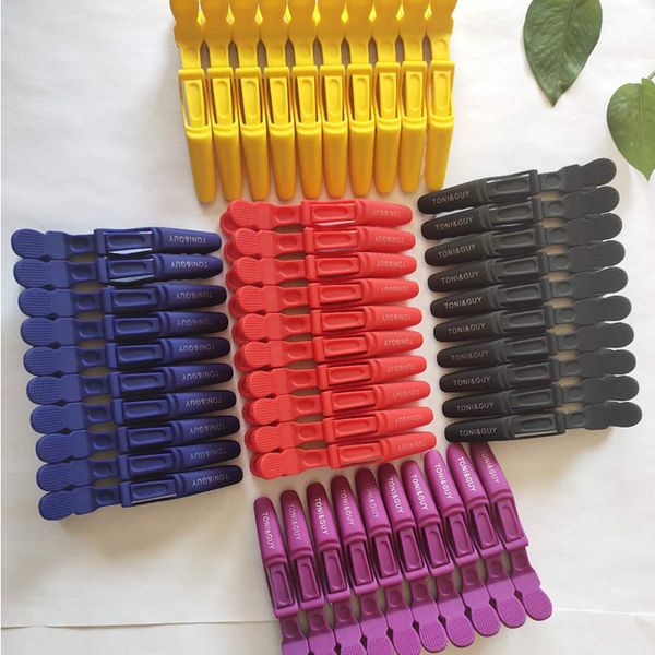 

wholesale of dual color high-temperature resistant crocodile clips for beauty salons, hair salons, hair perms, and styling