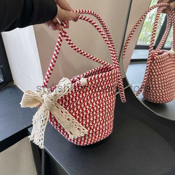 

2023 new pearl buckle scarf women's handwoven crossbody beach feng shui bucket foreign style grass woven bagstylishhandbagsstorestylish