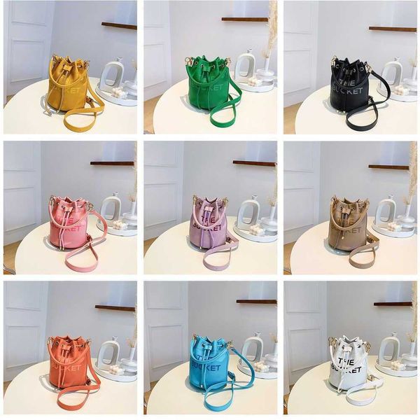

marcs small drawstring bag candy colors leather bucket bags women crossbody bags letter print designer handbags fashion woman designers wall