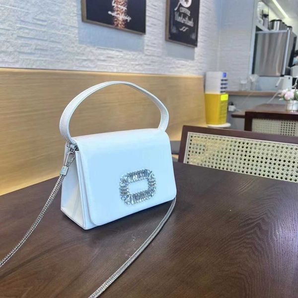 

2023 new snake bone chain french dinner small square bag shiny hand inlaid diamond bag water diamond handheld crossbody bag