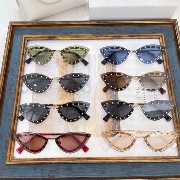 

2023 new luxury designer wind ins tidy cat's eye classic diamond sunglasses stars same sunglasses va2033, White;black