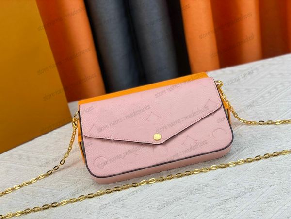 

2023ss by embossed pochette handbag womens luxurys designer bag empreinte leather includes two detachable pockets shoulder bag crossbody