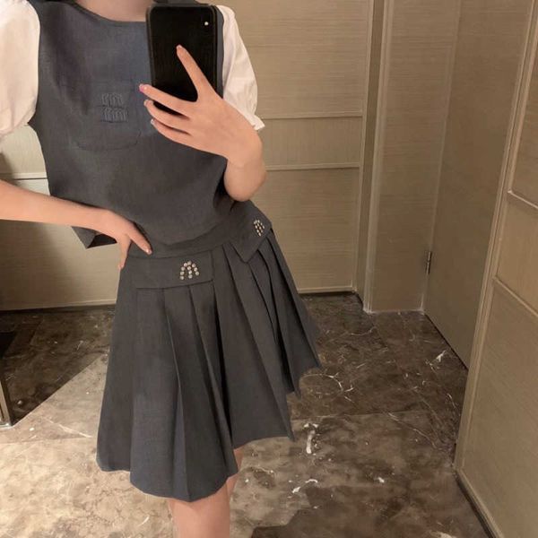 

23ss new skirt set designer womens set embroidered letters stitching short-sleeved diamond-encrusted pleated skirt women two-piece college s, White