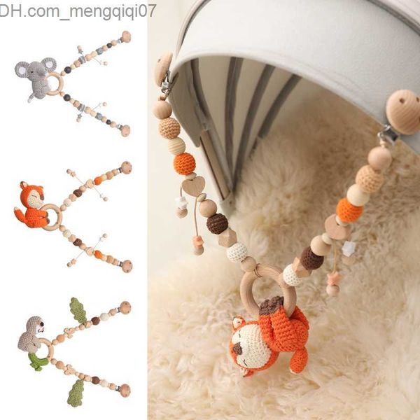 

pacifier holders clips# baby stroller chain wooden plum clip pacifier clip chain crochet animal teeth bracelet mobile stroller toy z230804
