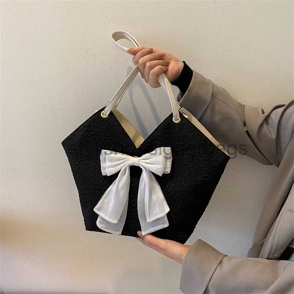 

korean version bow tie one tote commuting bag with large capacity for autumn and winter 2023 new fashion bagstylishdesign