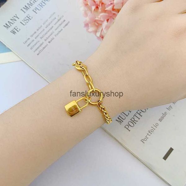 

european and american pig nose thick bracelet asymmetrical trend love letters small lock pendant titanium steel gold bracelet female, Golden;silver