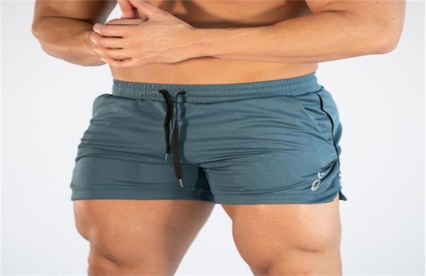 

mens gym shorts run jogging sports fitness bodybuilding thin sweatpants male profession workout training brand short pants c02222431023, White;black