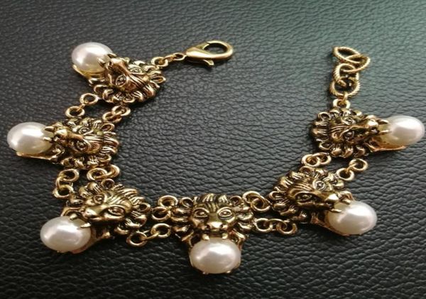 

new vintage metal leo head bracelets for women pearl bracelets fashion punk jewelry ancient animal bijoux bridal female accessorie1724428, Golden;silver