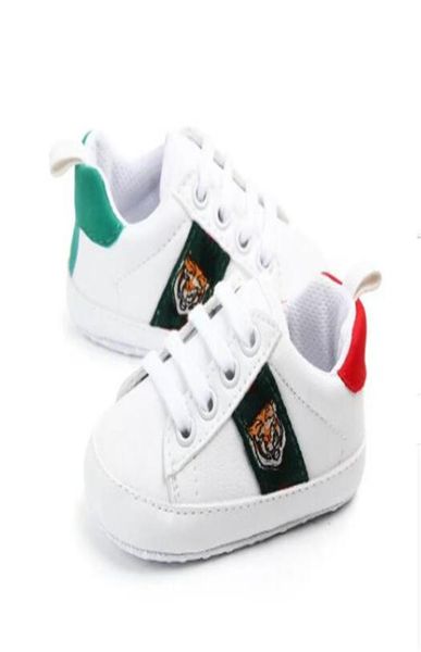 

newborn baby boys girls first walkers luxury designer kids toddlers infant lace up pu sneakers baby prewalker soft sole white shoe6184397
