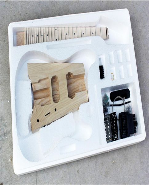 

factory electric headless semifinished guitar kitsdiy guitarno paintash bodymaple scalloped neckblack hardwarecan be change5041955