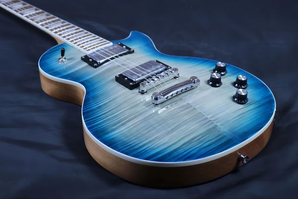 

custom electric guitar, mahogany solid body with blue padded maple, gold hardware,