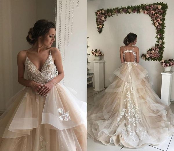 

2019 champagne ball gown wedding dresses v neck spaghetti straps appliques lace tulle tiered backless bridal dresses elegant weddi2262814, White