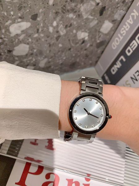 

new luxury women's watch quartz movement 316 case with unique design 33mm ring face, Slivery;brown
