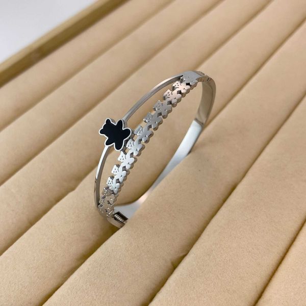

versatile fashion brand tiffay inlaid black hollow bear trend versatile open titanium steel spring bracelet