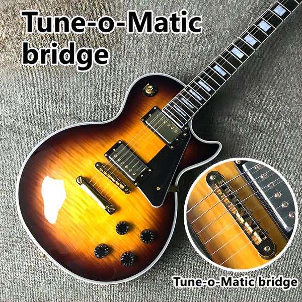 

electric guitar, rosewood fingerboard, flame maple tune-o-matic bridge,