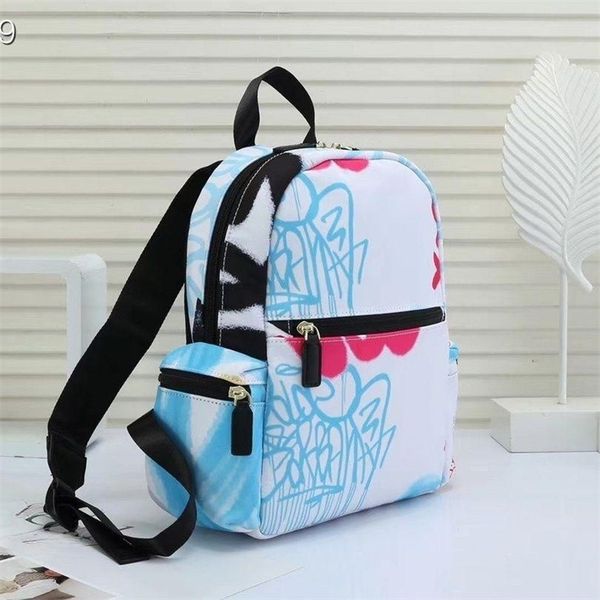 

2023 new men and women children foreign style small backpack travel outdoor light travel bag infant printed backpack small school bag a02