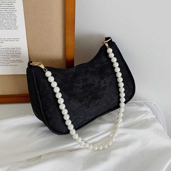 

popular bag women in the new trendy and fashionable pearl portable small bag westernized shoulder underarm bag