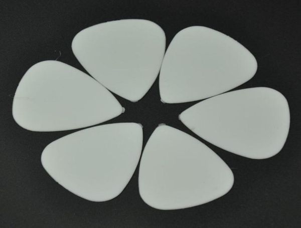 

100 pcs new medium 071mm abs guitar picks plectrums matte white4238629