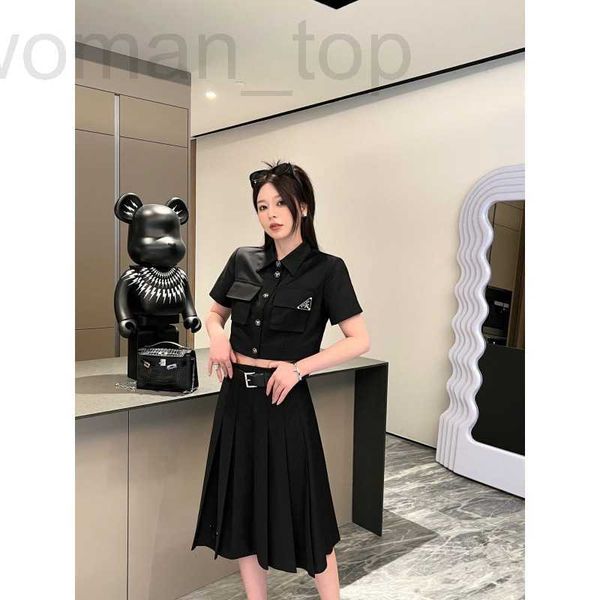 

women's t-shirt designer p family 23 spring/summer workwear style double pocket triangle decorative short high waist pleated half skirt, White